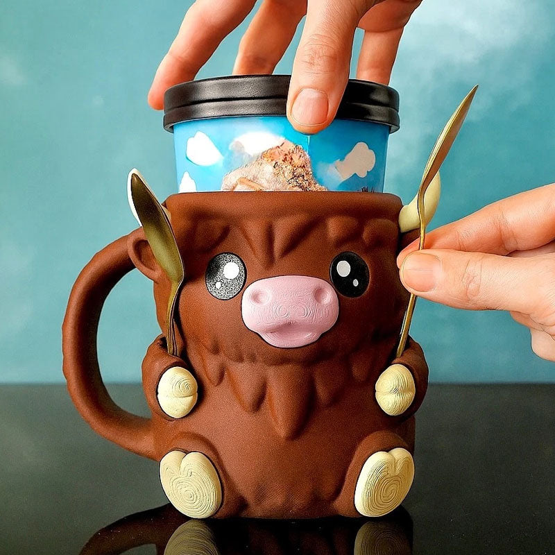 MooMelt™ – Le Support à Gobelet de Glace de la Petite Vache des Hautes Terres