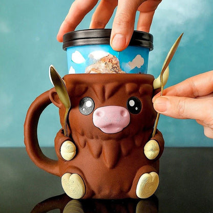 MooMelt™ – Le Support à Gobelet de Glace de la Petite Vache des Hautes Terres