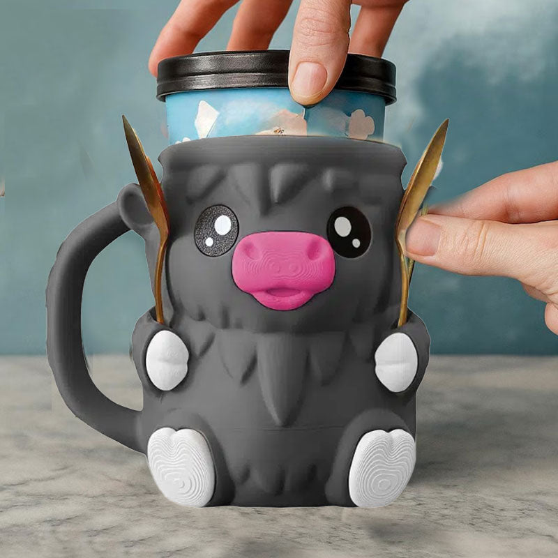 MooMelt™ – Le Support à Gobelet de Glace de la Petite Vache des Hautes Terres