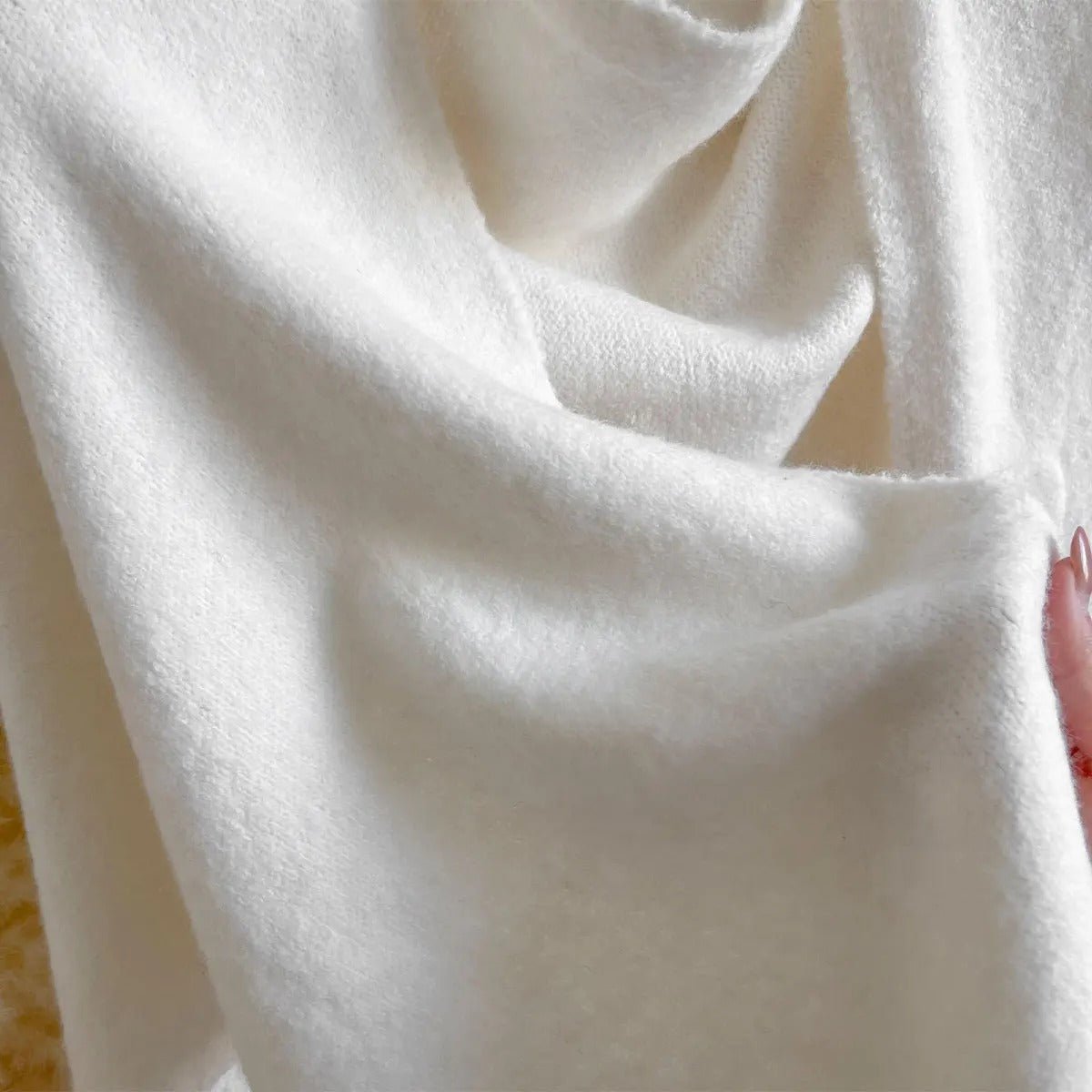 Veloura™ — Châle polaire léger au style intemporel